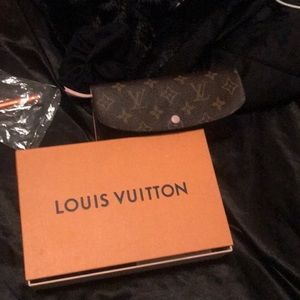 Louis Vuitton wallet with pink interior